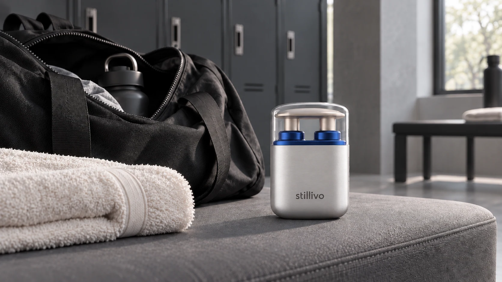 Capped stillivo beside a gym bag and folded towel
